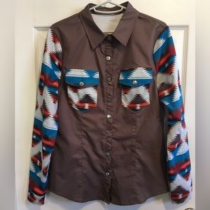 EUC. Long sleeve, snap closure with cute ruffle detail, Western/Aztec print.